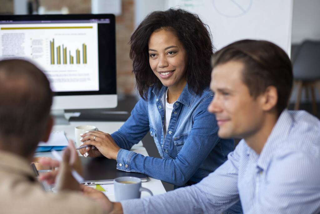 Professionals reviewing fixed-income market data