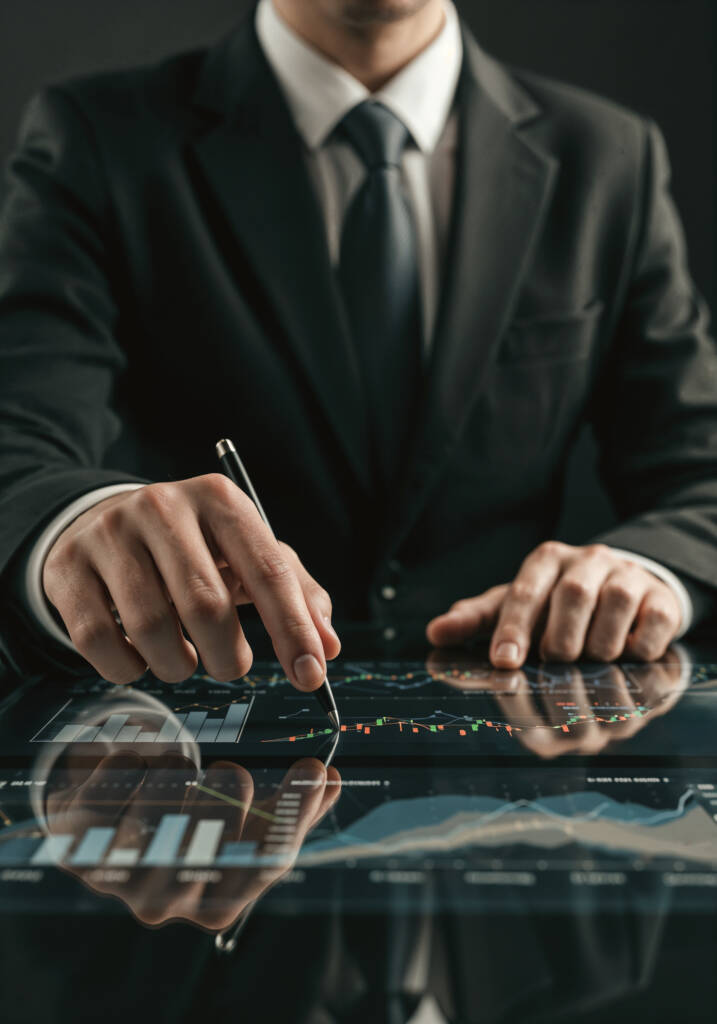 Professional analyzing institutional market data