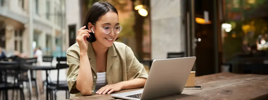 Professional working on a laptop outdoors